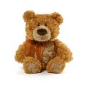 11 in height - Flynn tan teddy bear provides timeless design with a luxury touch. Distinctive rose-swirl pattern plush and a chi